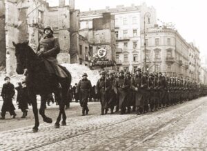Вооружённый силы Германии (Вермахт) маршируют по капитулировавшей столице Польши, Варшаве, 1 октября 1939 года